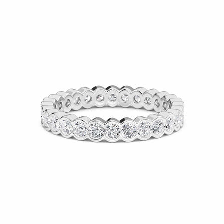white gold ring with diamond accents on a white background