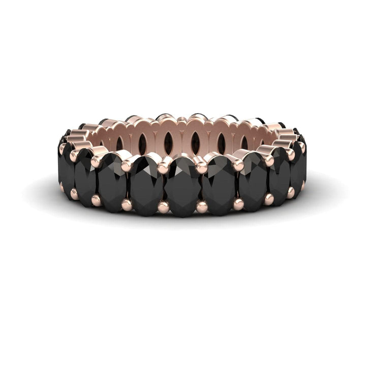 The Black Diamond Full Eternity Band - Diana showcases a continuous row of oval black gems in rose gold prong settings, displayed on a white background.
