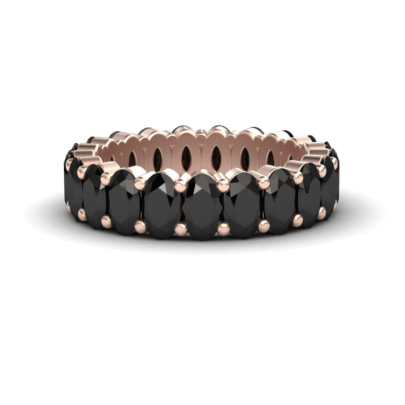 The Black Diamond Full Eternity Band - Diana showcases a continuous row of oval black gems in rose gold prong settings, displayed on a white background.