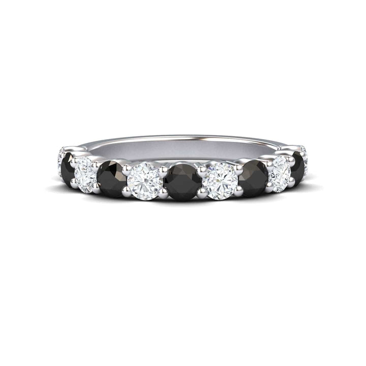 The Parveen Black & White Diamond Half Eternity Wedding Ring features alternating round black and white diamonds set in a continuous silver band.