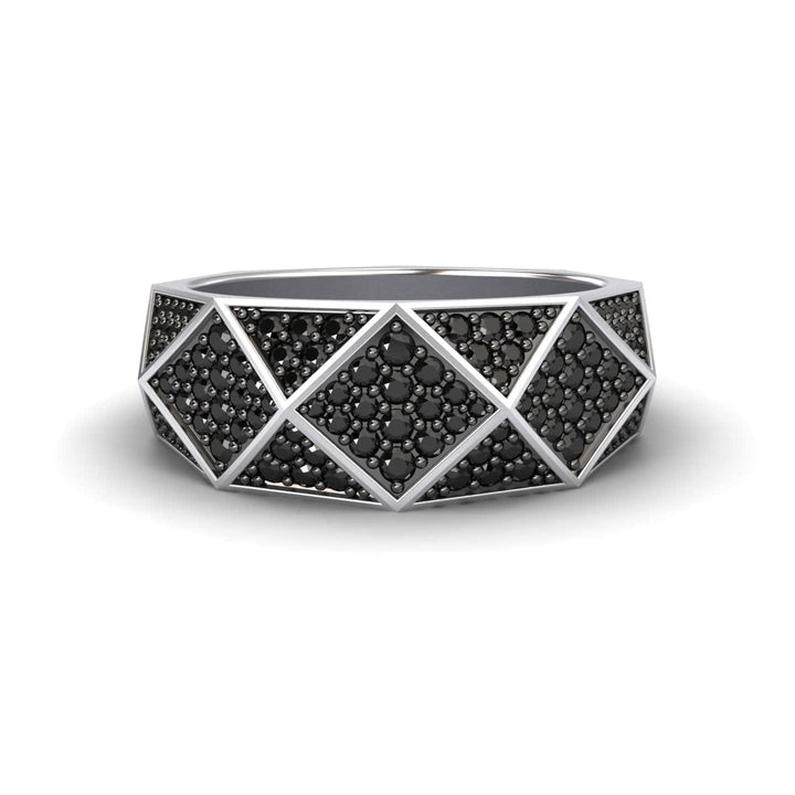 The Black Diamond Geometric Pave Set Statement Band - Blanca features a wide silver band with triangular sections accented by pave-set black stones for a bold, modern look.