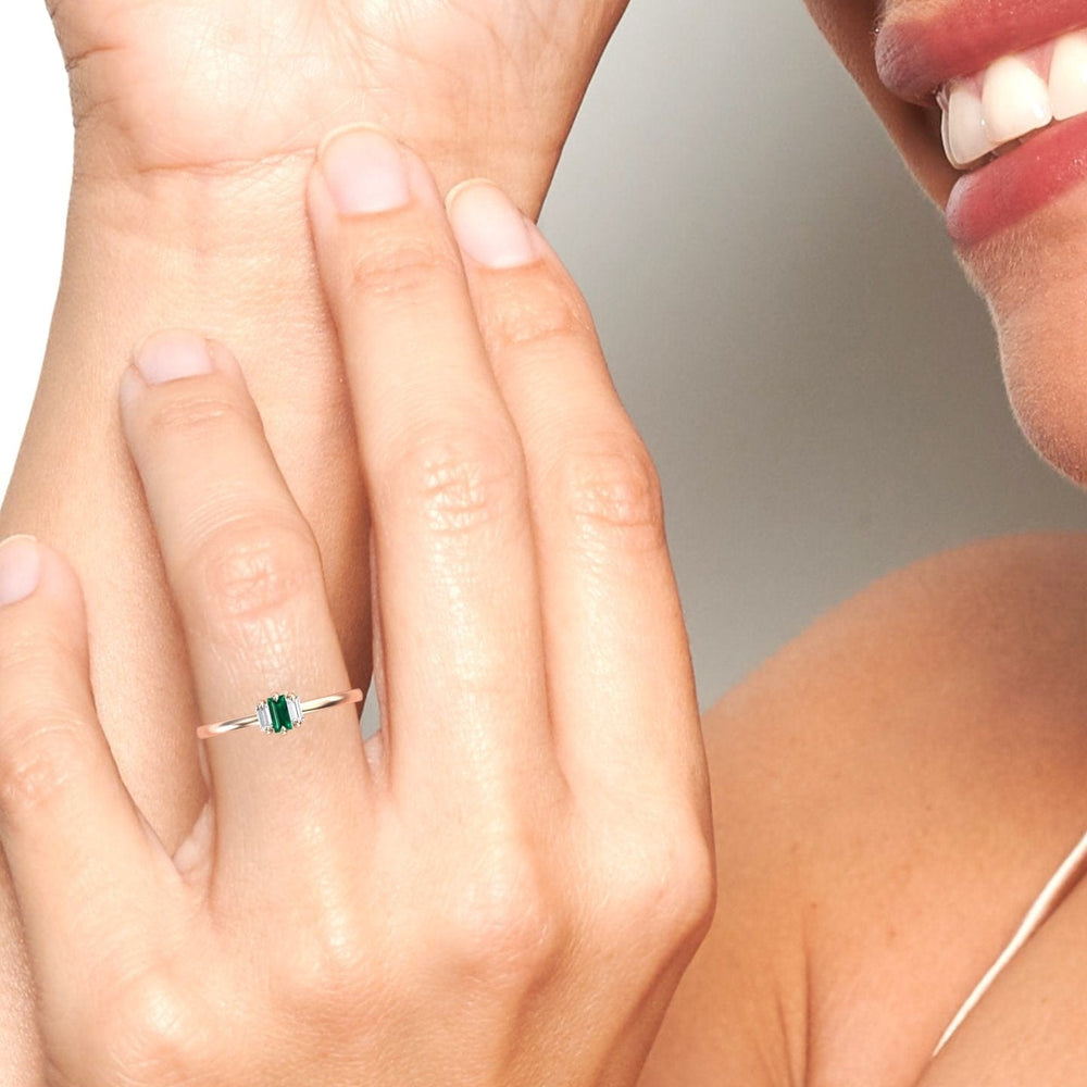 0.13-carat Emerald & Diamond Three Stone Ring in 14K Rose gold, Marina style, hand second view