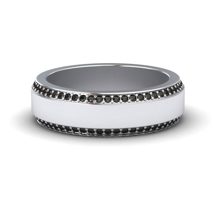 The Black Diamond 6mm Eternity Wedding Ring - Caleb features a wide silver band with two rows of small black stones along the edges and a smooth, polished center.