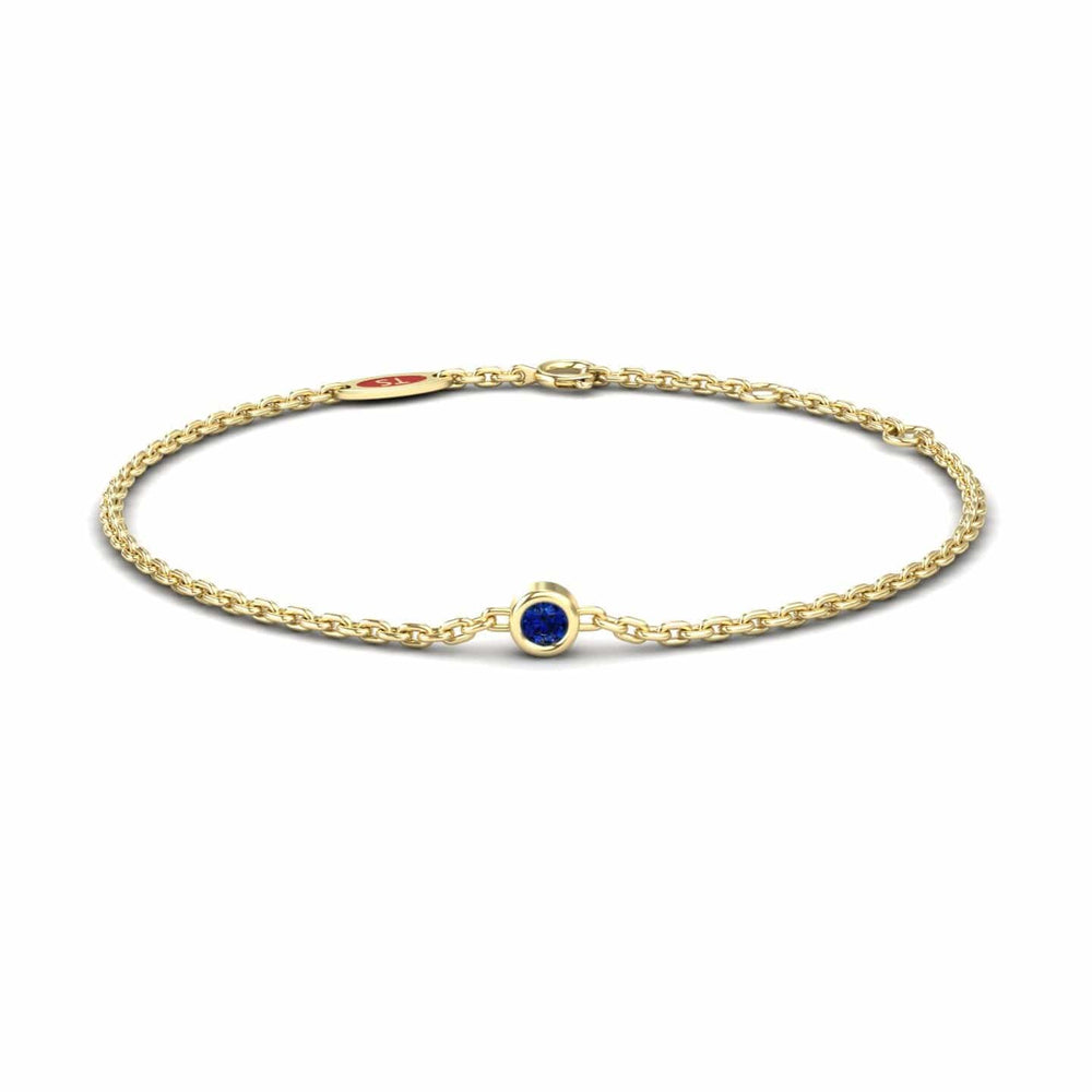 0.08-carat blue sapphire bezel set chain bracelet in 18K yellow gold, aisha style, front view