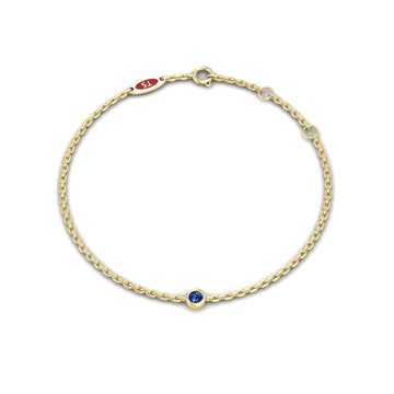 0.08-carat blue sapphire bezel set chain bracelet in 18K yellow gold, aisha style, side view