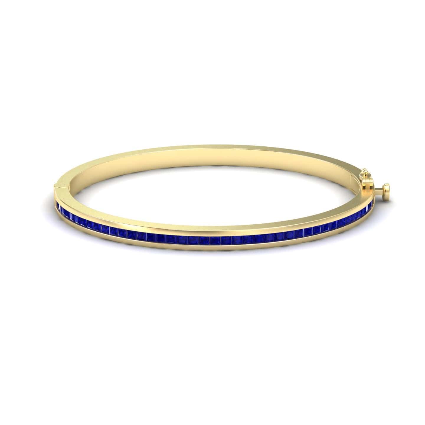 2.87-carat blue sapphire channel set bangle bracelet in 14K yellow gold, johanna style, front view