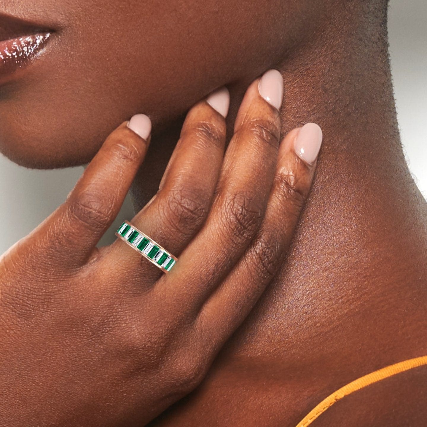 1.17-carat Emerald & Diamond Channel-Set Eternity Band in 14K Rose gold, kyra style, hand view