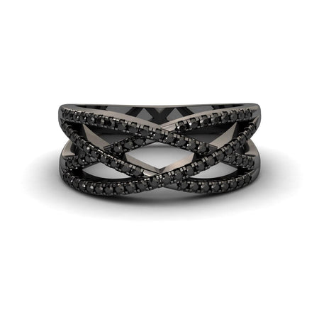 The Black Diamond Criss-Cross Pave Band Ring - Eden features multiple thin black bands set with sparkling black stones in a bold, modern design. Shown on a white background, it’s an elegant statement piece.