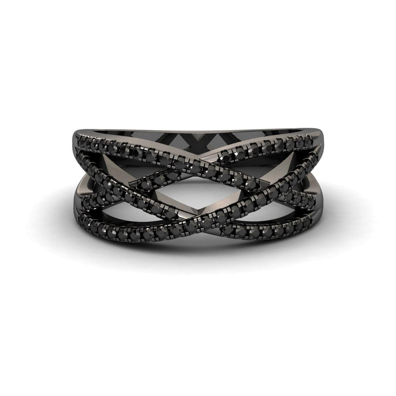 The Black Diamond Criss-Cross Pave Band Ring - Eden features multiple thin black bands set with sparkling black stones in a bold, modern design. Shown on a white background, it’s an elegant statement piece.