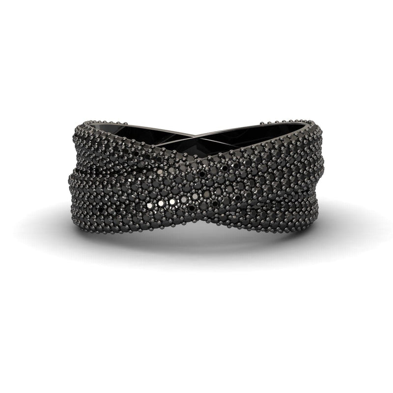The Black Diamond Pave Crossover Statement Ring - Noor features a crisscrossed black design with textured, raised bead details for a modern, intricate look.